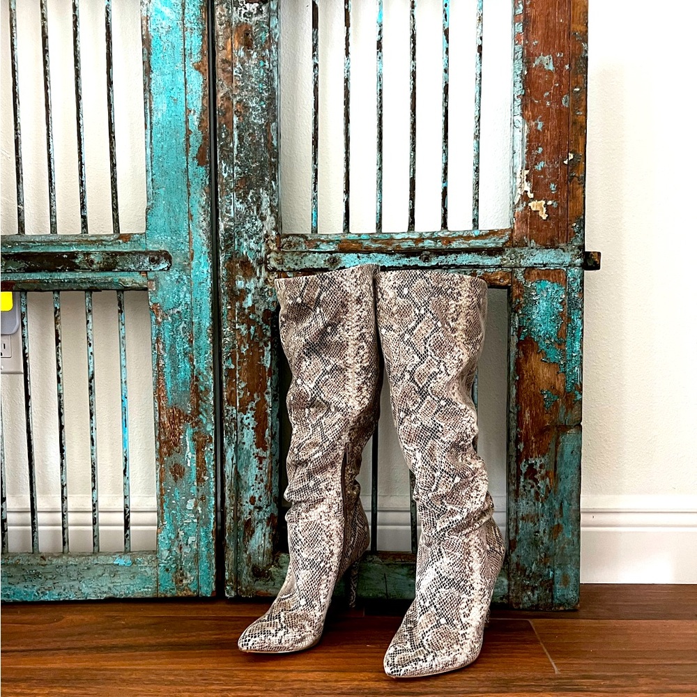 Fabulous Jessica Simpson size 8 snakeskin zip up boots